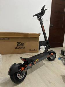 Scooter Eléctrico de Aluminio Moderno KUKIHIN G4, Nuevo, Negro y Naranja, Motor Dual, Plegable, para Adultos, con Freno y Manillar - Product Image 1