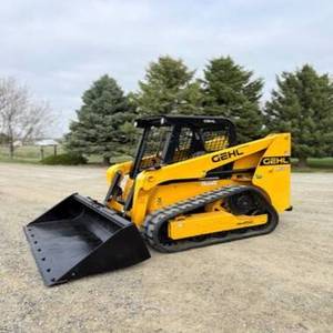 Minicargadora compacta usada Gehl RT165 con orugas diésel, color amarillo, equipo de construcción, 75KW, capacidad de cucharón de 6.45m, en venta. - Product Image 2