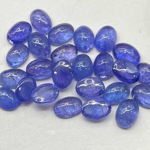 Vente en gros cabochon en tanzanite naturelle 7x9mm taille ovale calibrée pierre précieuse bleue avec traitement thermique pour la fabrication de bijoux - Product Image 4