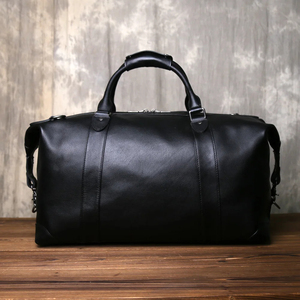 Sac de voyage en cuir noir avec fermeture à glissière pour les voyages - Product Image 1