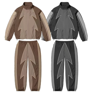 Conjunto de chándal con cremallera bordada de fabricante, conjunto de Jogger, chándales cortavientos de nailon con bloques de color para hombre - Product Image 1