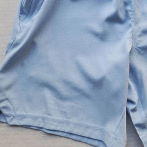 กางเกงขาสั้นผู้ชายผ้าฝ้าย 100% แบบเรียบง่าย ระบายอากาศ แห้งเร็ว เหมาะสำหรับออกกำลังกาย ดีไซน์ยืดหยุ่น คล่องตัว - Product Image 6