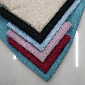 Tela de punto con volantes de alta calidad, mezcla de Spandex de poliéster, resistente al encogimiento antiestático, estirable, fábrica de textiles duraderos OEM - Product Image 2