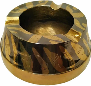 A striking, round <b>ashtray</b> with a gold and dark-toned tiger stripe pattern - Product Image 1