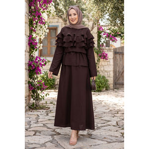Ensemble jupe en crêpe marron café deux pièces avec short évasé taille XS, haut à volants et haut superposé style club - Product Image 1