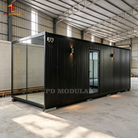 Cabane préfabriquée noire directement de l'usine pour parcs de vacances, complexes hôteliers en plein air, chambres d'hôtes et locations.