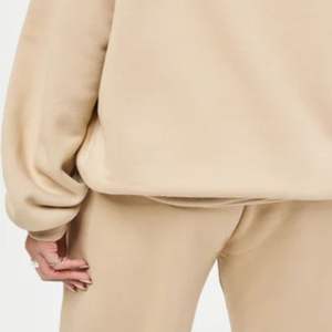 Polaire vierge avec logo personnalisé Éponge française Épaule tombante Sans ficelle Unisexe Hommes Femmes Sweats à capuche en coton épais et surdimensionné - Product Image 6