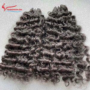 Paquets de cheveux Remy vietnamiens de trame birmane de haute qualité non transformés grand stock avec des boucles de vagues naturelles alignées sur les cuticules - Product Image 1