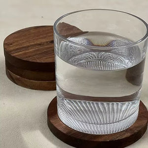 Handcrafted wooden coaster set offering natural beauty durability and <b>practical</b> everyday usability - Product Image 1