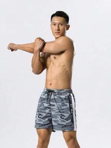 กางเกงขาสั้นวิ่งออกกำลังกายผู้ชาย ผ้าฝ้ายแห้งเร็ว รับสกรีนโลโก้ ระบายอากาศดี เหมาะสำหรับฟิตเนสและยิม กางเกงลำลองเรียบง่ายสำหรับเล่นกีฬาฤดูร้อน - Product Image 5