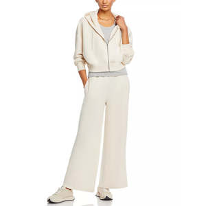 ชุดแทรคสูทสไตล์แบ็กกี้สำหรับผู้หญิง ผลิตจากโรงงานโดยตรง รับสั่งตัดตามขนาด ชุดลำลองทรงขาบาน ราคาสมเหตุสมผล - Product Image 1