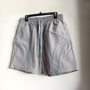 Conjunto cortavientos unisex ligero, chaqueta y pantalones impermeables y transpirables, perfecto para actividades de running al aire libre. - Product Image 5