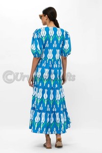 Puff Sleeve Maxi silueta con sus bolsillos de popelina de algodón suavemente estructurados y un cierre seguro de gancho y ojo en el cuello - Product Image 6