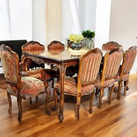 Ensemble de table à manger en teck massif artisanal avec chaises rembourrées |   Meubles de salle à manger modernes et luxueux pour appartements et hôtels |   Java