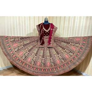 Lehenga Choli de mariée lourde avec 12 Kali Flair et double broderie à la main et Jarakan Dupatta sur tissu non cousu - Product Image 1