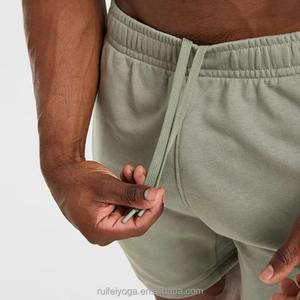 กางเกงขาสั้นออกกำลังกายผ้าฟลีซสำหรับผู้ชาย ผลิตตามแบบ OEM พร้อมโลโก้สั่งทำ ผ้าฝรั่งเศสเทอร์รี่ 100% ผ้าฝ้าย สำหรับวิ่งและเล่นกีฬา - Product Image 5