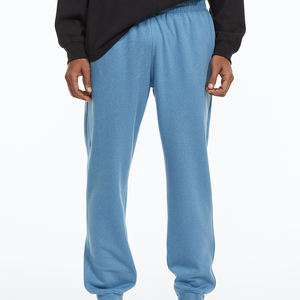 OEM personalizado negro pantalones de correr de gran tamaño para los hombres de moda de invierno de pista de sudor con cremallera hecha de lona - Product Image 2