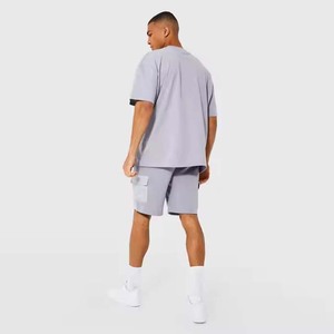 Camiseta que absorbe la humedad con logotipo personalizado, pantalones cortos de entrenamiento informales para gimnasio, ropa deportiva ligera, conjunto de ropa de verano para hombre de 2 piezas - Product Image 4