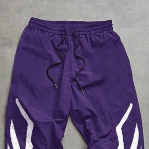 กางเกงซับเหงื่อผ้าฝ้ายเทอร์รี่สำหรับผู้ชายโอเวอร์ไซส์พิมพ์ลายเอวกลางสไตล์ลำลอง - Product Image 4