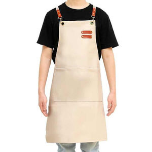 Delantales de salón con logotipo personalizado 100% delantales de peluquero de cuero genuino para salón - Product Image 1