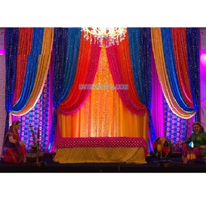 Fabuloso Mehndi noche escenario telón de fondo configuración Punjabi Sangeet noche telón de fondo cortina para escenario colorido indio boda telón de fondo conjunto - Product Image 1