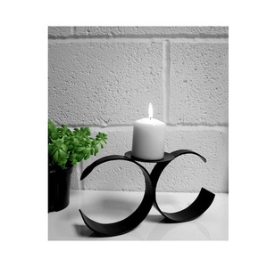 Elegant metal candle tealight holder crafted to bring warm gentle <b>light</b> and enhance soft warmth in home <b>space</b> - Product Image 2