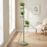 Support à plantes moderne à 3 niveaux en métal avec étagères circulaires pour plantes vertes d'intérieur et pots de fleurs au design minimaliste