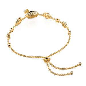 Bracelet jonc Jeulia en acier inoxydable plaqué or, motif papillon et fleur, style vintage classique, cadeau idéal - Product Image 4