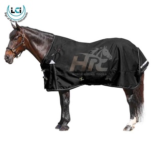 Couvertures pour chevaux équestres fabriquées en tissu Cordura de haute qualité, avec rembourrage intérieur en coton ou en polaire, selon le choix et sur mesure. - Product Image 1