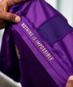 Camiseta Deportiva Transpirable de Manga Corta Color Morado con Logotipos en Contraste y Diseños Impresos por Transferencia de Calor - Product Image 6