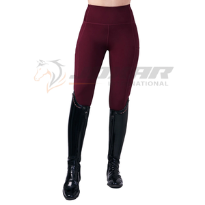 Jodhpurs d'équitation durables conçus avec une ceinture souple en tissu souple, des coutures renforcées et une prise confortable pour des performances de conduite - Product Image 1
