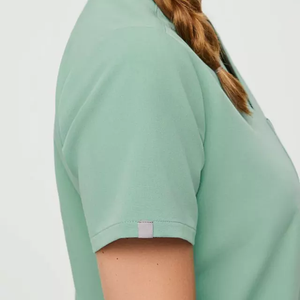 Conjuntos de uniformes de precisión con una construcción limpia de manga corta y cuello alto suave para largas horas - Product Image 3