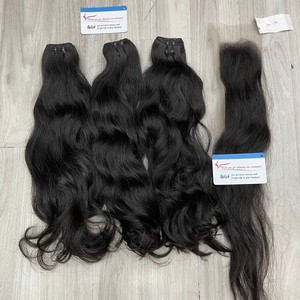 Prêt à expédier 100% paquets de cheveux bruts humains vietnamiens Extension de cheveux de trame ondulés naturels non traités et fermeture à lacet - Product Image 1