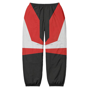 Pantalon de survêtement à boutons personnalisés en gros Pantalon coupe-vent en nylon à rayures pour femmes à vendre Vêtements de ville de haute qualité - Product Image 1