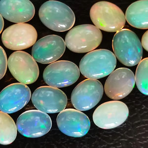 Cabochon d'opales blanches coupe ovale 6x8mm opale éthiopienne pierres précieuses en vrac pour bijoux dos plat multi feu Welo opales lot en gros - Product Image 1