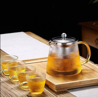Théière en verre ronde de thé de théière en verre de Borosilicate élevé avec l'infuseur en acier