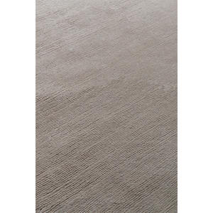 Alfombra de fibra natural hecha a mano con lana suave y tonos tierra sutiles para hogares modernos ecológicos - Product Image 1