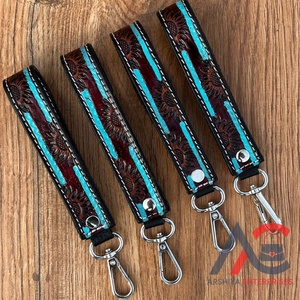 พวงกุญแจหนังแท้สำหรับผู้หญิงสายคล้องข้อมือลายดอกไม้ตะวันตก - Product Image 1