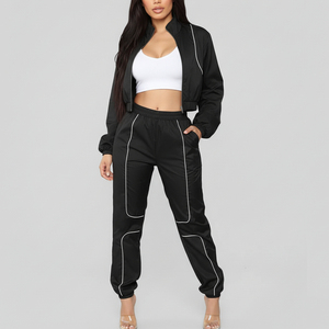 Chándal deportivo de nailon cortavientos de encaje de alta calidad con logotipo personalizado para mujer, conjunto de 2 piezas con cremallera de invierno - Product Image 1