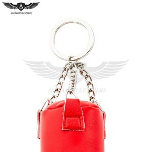 Porte-clés en cuir perforé de couleur rouge solide, produit tendance 2025, vente en gros, fabrication sur mesure - Product Image 5