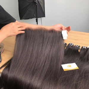 Cabello empaquetado paquete sin pegamento con cierre frontal de encaje HD de alta calidad vietnamita crudo - Product Image 1