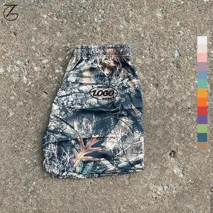 Short de basket-ball camouflage avec logo personnalisé Short de basket-ball à séchage rapide, respirant et anti-rides, avec maille à sublimation - Product Image 1