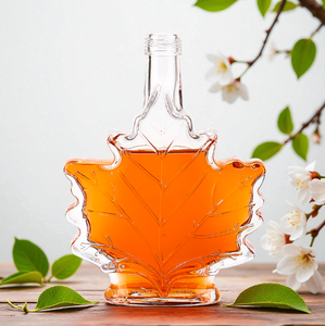 Vente chaude Bouteille <span class=keywords><strong>à</strong></span> spiritueux en verre transparent en forme de feuilles d'<span class=keywords><strong>érable</strong></span> personnalisée Haute qualité 375 ml 750 ml Bouteille de whisky vodka - Product Image 1