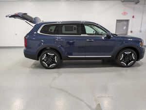 รถ SUV รุ่น TELLURIDE S AWD ปี 2024 สภาพดีเยี่ยม เกียร์อัตโนมัติ 8 สปีด สีน้ำเงินภายนอก กำลัง 291 แรงม้า ระบบส่งกำลังแบบครอสโอเวอร์ - Product Image 4