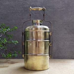 Elegant handcrafted brass tiffin <b>box</b> featuring <b>strong</b> handle and sturdy build perfect for everyday use at work or school - Product Image 1