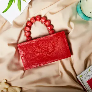 Bolso de mano hecho a mano de resina acrílica elegante para mujer, bolso de mano de lujo bohemio con patrón de caramelo y cremallera, botón de perla portátil para fiesta de noche - Product Image 1