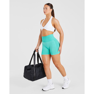 Sujetador deportivo de cuello Halter blanco personalizado con escote en V, detalle de espalda abierta y Sujetador deportivo de alto impacto para mujeres adultas - Product Image 4