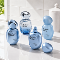 Flacon de parfum en verre de 50 ml en gros, forme galet, style estival coloré, contenant de parfum, chaîne d'approvisionnement prête à l'emploi, vente en gros
