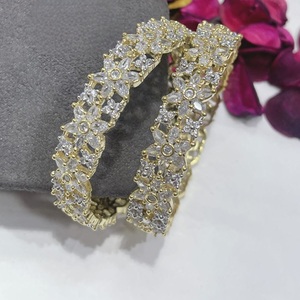 <b>Charming</b> Best Quality Gold White Polish CZ Stones Look Four Set Of Bangles Wedding Function Wear Collection <b>for</b> Women <b>Girls</b> - Product Image 1