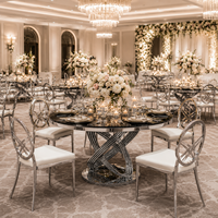 Table ronde de luxe en acier inoxydable argenté pour hôtel, idéale pour les événements et les fêtes